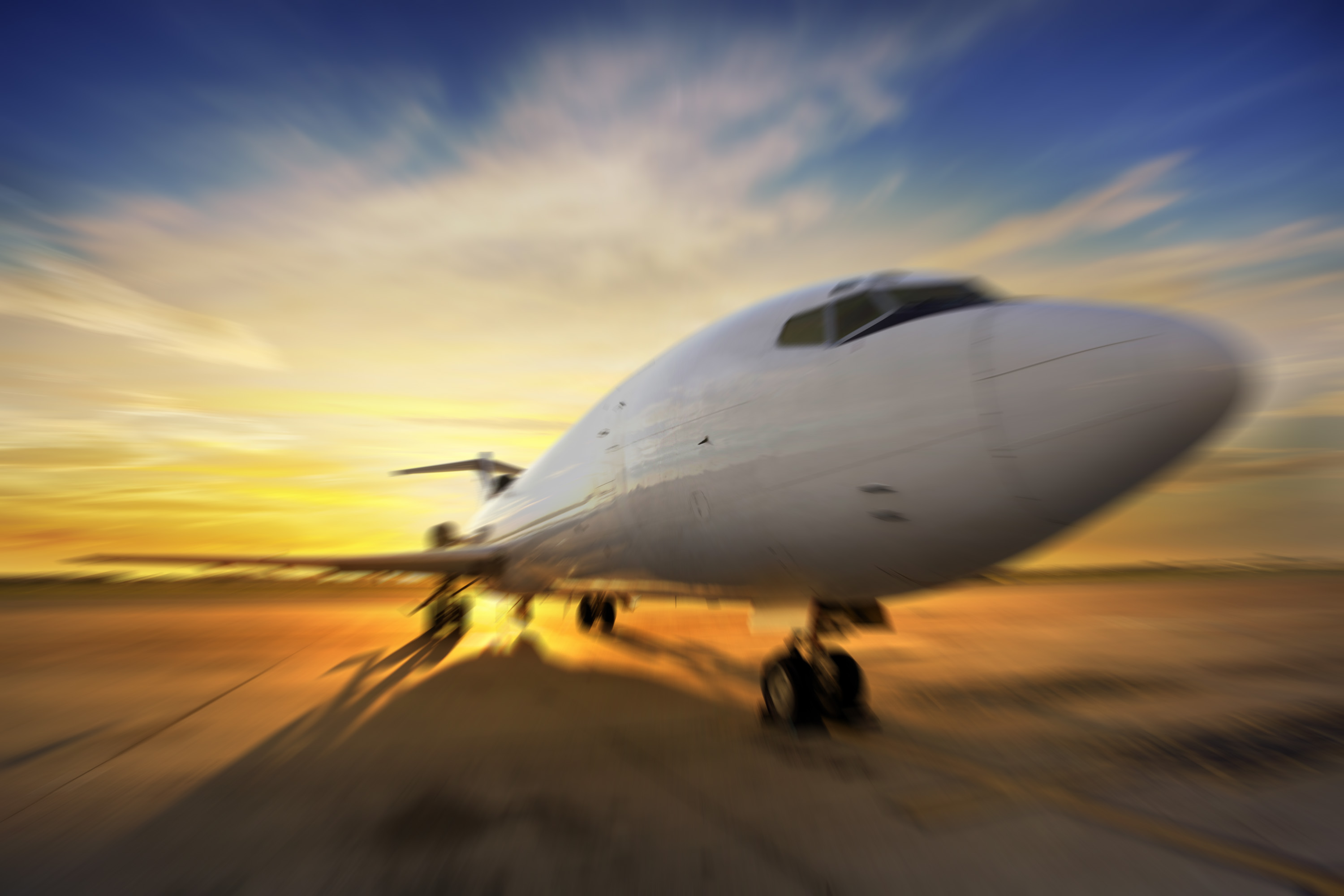 Passenger Jet against sunrise